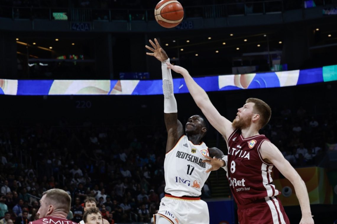 Nemci po razburljivem boju tesno ugnali Latvijo za polfinale SP